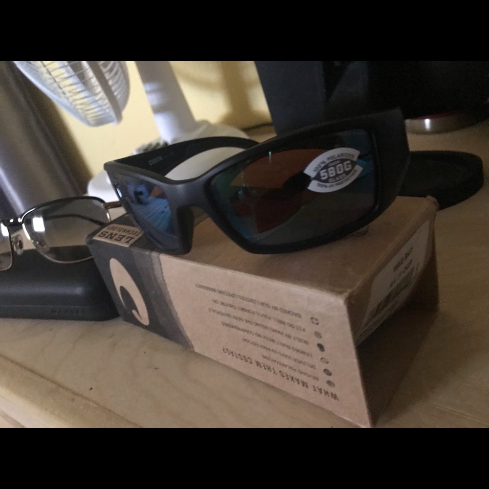 Brand new pair of Costa sunglasses with original case